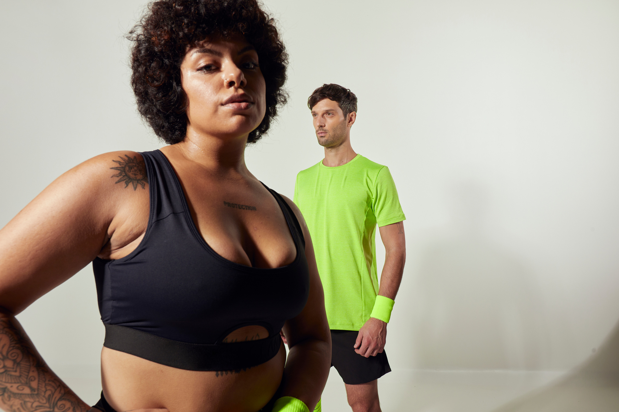 Diverse Man and Woman in Sports Clothing